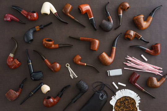 Collection of pipes and pipe smoking utensils