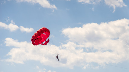 Riding on a parachute behind a boat Among the popular beach activities. One of the most popular sea activities.