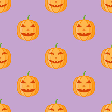 Seamless pattern with halloween pumpkins on purple background. Vector texture.
