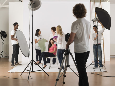 Group of multiethnic young people in studio during photo session