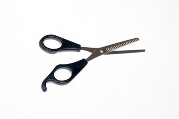 professional effileer haircut scissors on white background