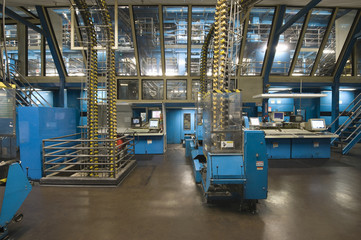 Interior view of a spacious newspaper factory