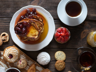 Fototapeta na wymiar Breakfast table with pastries