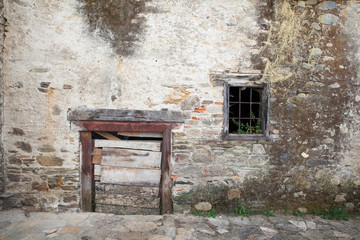 Little door of rural house in the spanish town