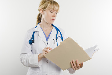 Female doctor with medical file isolated over white background