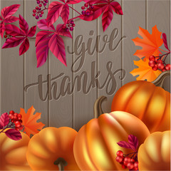 Thanksgiving greeting card. Handwritten brush calligraphy and autumn leaves, berries and pumpkins.