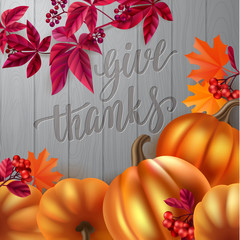 Thanksgiving greeting card. Handwritten brush calligraphy and autumn leaves, berries and pumpkins.