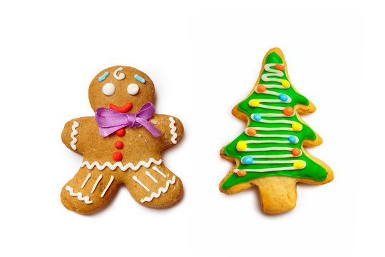 Closeup image of gingerbread man and Christmas tree isolated