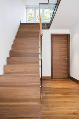 View of wooden staircase and floor in house