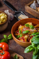 Homemade tortellini with tomato sauce