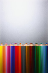 Row of multi colored pencils