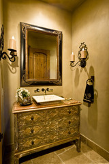 View of a mirror and sink in modern home