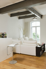 Modern living room with view of bar area at home