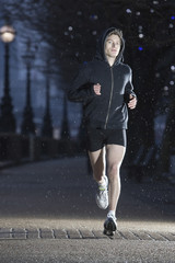 Full length of a male runner on early winter morning in London