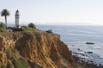 Fototapeta na wymiar Pigeon Point Lighthouse on cliff, California, USA