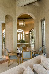 Cropped sofa with dining area in the background at modern house