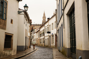 Fototapeta na wymiar View of Santiago street under the drizzle