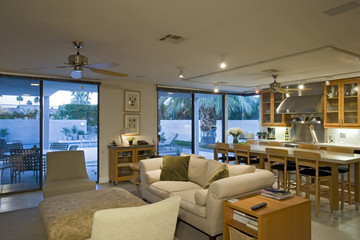 Living room with view of dining and kitchen in the background