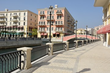 Obraz premium Canal view in Venice-like Qanat Quartier of the Pearl precinct of Doha, Qatar.