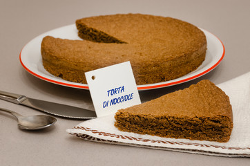 “Torta di nocciole”, traditional hazelnut cake made with “Nocciola Piemonte Igp” (also...