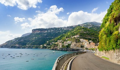 road on Amalfi coast with beautiful view on Minori village, Campania, Italy - 129980235