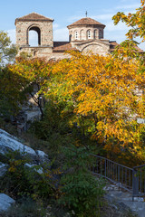 Obraz premium Yellow trees and Church of the Holy Mother of God in Asen's Fortress, Asenovgrad, Plovdiv Region, Bulgaria