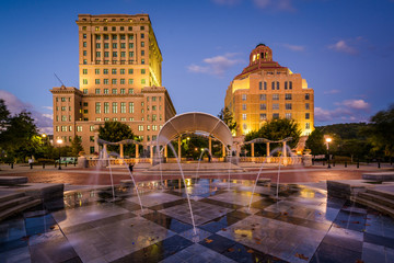 Fountains and buildings at night, at Pack Square Park, in downto