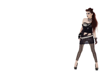 Portrait of beautiful young punk woman posing over white background