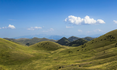 Panoramic view of beautiful landscape with Gran Sasso d'Italia peak at Campo Imperatore plateau in the Apennine Mountains, Abruzzo, Italy