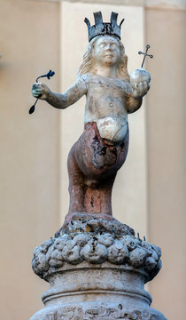 The Taormina's emblem, two-legged centaur wearing a crown and hoisting a scepter in the right hand and a globe in the left, set on top of the Baroque  fountain built in 1635 in Taormina, Sicily, Italy