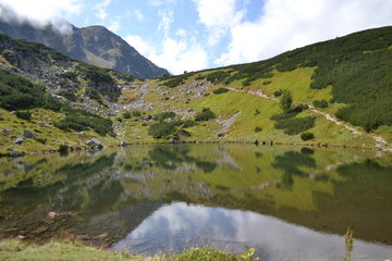Fototapeta na wymiar Lake in West Tatras in Slovakia. Summer 2015