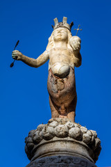 Fototapeta na wymiar The Taormina's emblem, two-legged centaur wearing a crown and hoisting a scepter in the right hand and a globe in the left, set on top of the Baroque fountain built in 1635 in Taormina, Sicily, Italy