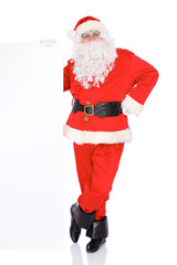 Santa Claus standing isolated on white background. Full length portrait