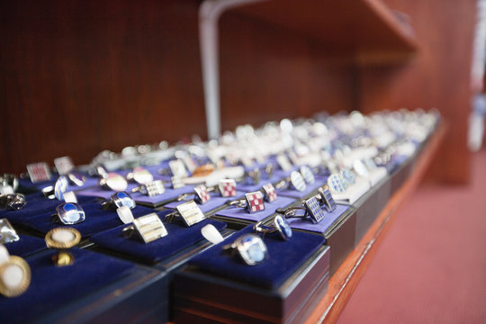 Set of hand cufflinks on display