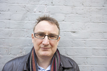 Portrait of a relaxed mature man wearing eyeglasses