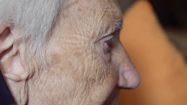 sad old woman: closeup portrait