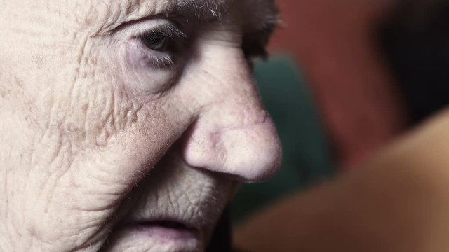 sad old woman closeup portrait