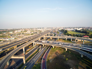 Fototapeta na wymiar Aerial view above the busy Motorway & Ring Roads Inter-Change Systems