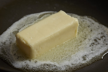 butter melting in a skillet