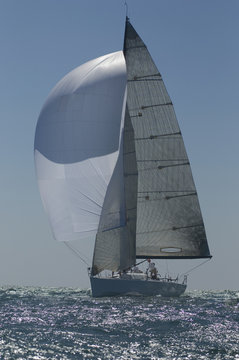 View of a yacht competing in team sailing event