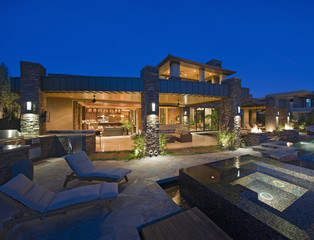 Exterior of contemporary house with plunge pool at dusk - obrazy, fototapety, plakaty