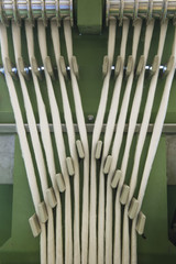 Obraz premium Closeup of machinery part at spinning factory