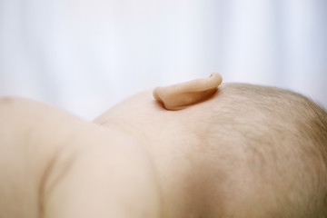 Closeup of baby boy's ear