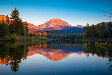 Sunset at Lassen Peak with reflection on Manzanita Lake