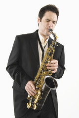 Man playing saxophone isolated over white background
