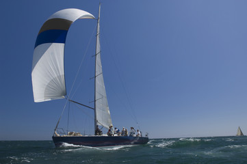 View of a yacht competing in team sailing event