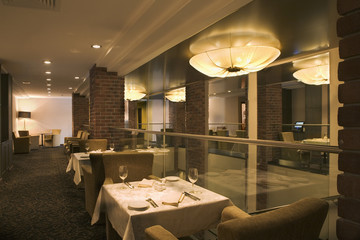 The interior of hotel Restaurant with elegant table setting