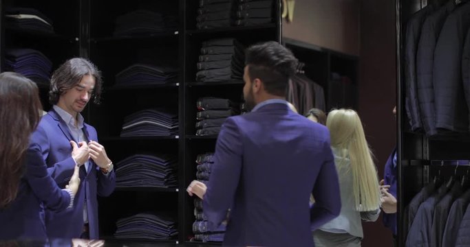 Two Business Man Trying Jacket Fashion Shop, Customer Choosing Clothes Retail Store, Shopping Assistant Formal Wear Slow Motion 60 Fps
