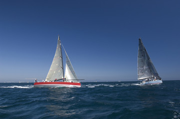 Fototapeta premium View of two yachts competing in team sailing event