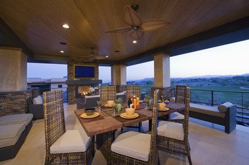 Open plan dining area with fireplace in modern house